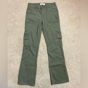 Bell bottom cargo pants. Tight fit and short legs.